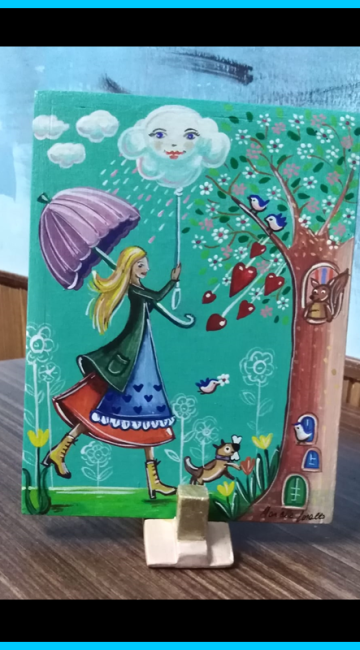 La ragazza, i colori d’Autunno, gli animali e la pioggia allegra